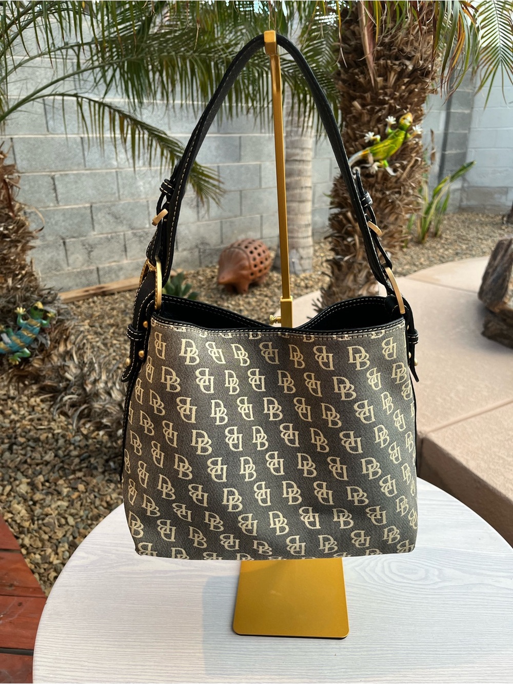Vintage Dooney & Bourke CreamMonogram Shoulder Bag with Navy Blue Leather Trim